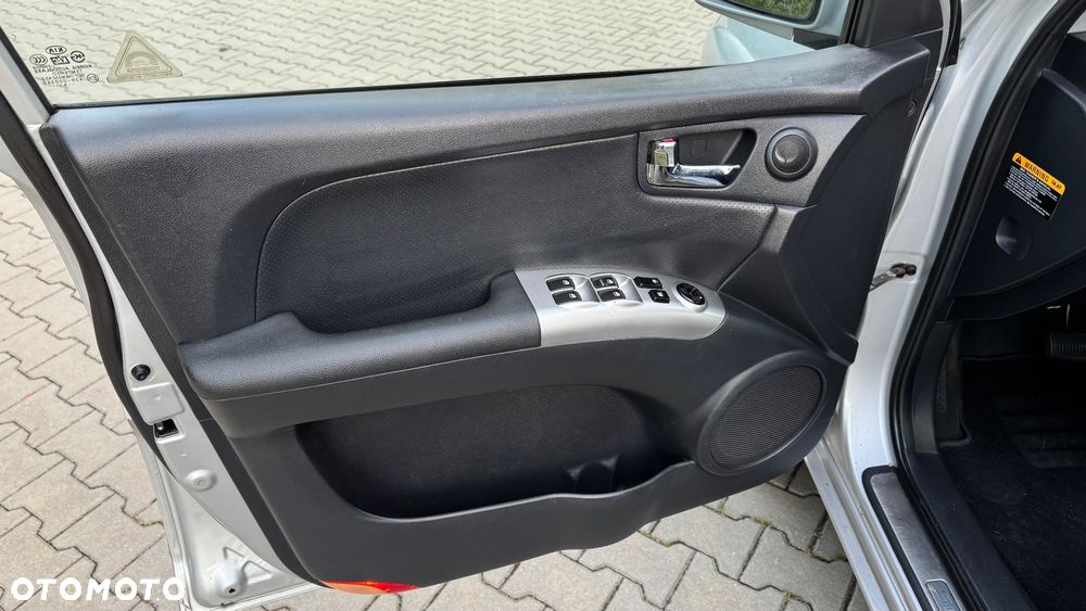 Kia Sportage 2.0 CRDI EX - 13