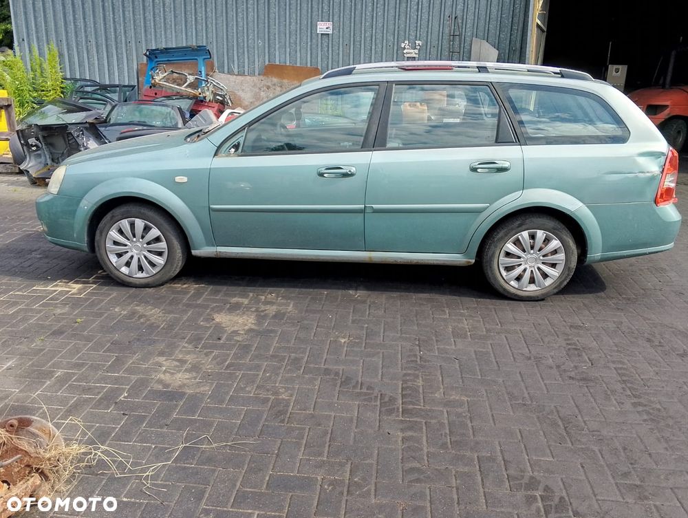 Chevrolet Lacetti I (03-09r.) 1.6 B 108KM. Silnik F16D3 Skrzynia EMG.Cały na części.GWARANCJA !!! Przód Tył Zestaw Komplet Drzwi Klapa Zderzak Błotnik Maska Grill Atrapa Szyba Pas Lampa Lusterko Boczki Fotel Kanapa Kokpit Deska Rozdzielcza Przełącznik Włącznik Sterownik Przewody Wiązka Instalacja Moduł Komputer Czujnik Listwa Pompa Alternator Wtryski Głowica Rozrusznik Kompresor Sprzęgło Dwumas Silnik Skrzynia ABS Klimatyzacji Paliwa Wspomagania Kolektor Turbina Przepustnica Zawór Chłodnica Koło Hak Belka Sanki Zawieszenie Mcpherson Półoś Amortyzator Wydech Tłumik Zacisk Most - 5
