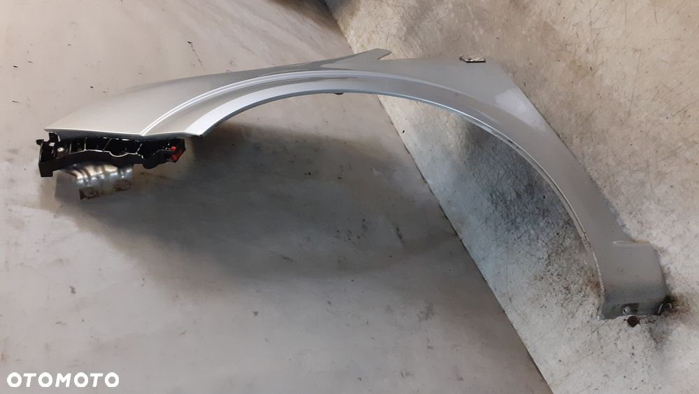 * OPEL ZAFIRA B Z157  BŁOTNIK PRZÓD PRZEDNI LEWY SREBRNY - 3