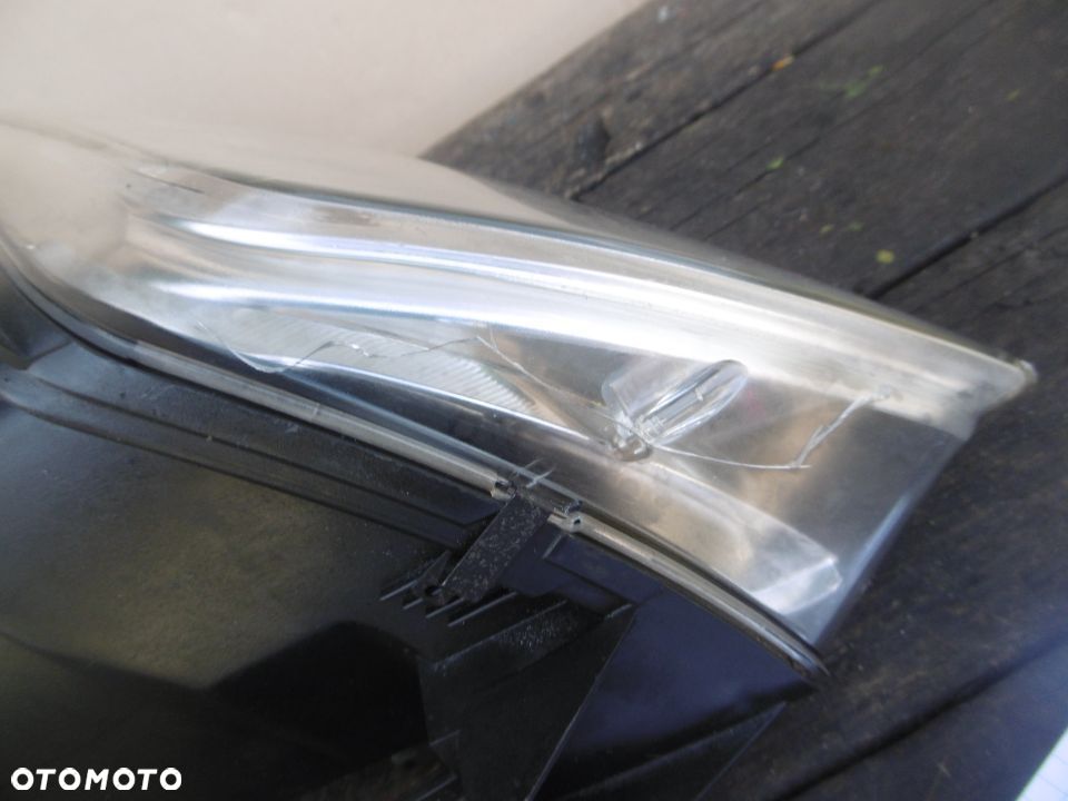 lampa lewa Passat B5 FL Hella Europa - 6