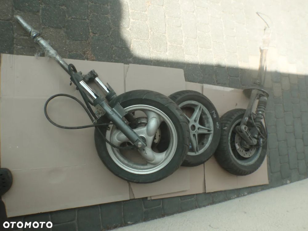 amortyzator amor laga przód zacisk przewód hamulcowy Kymco Agility 07r koło12 - 13