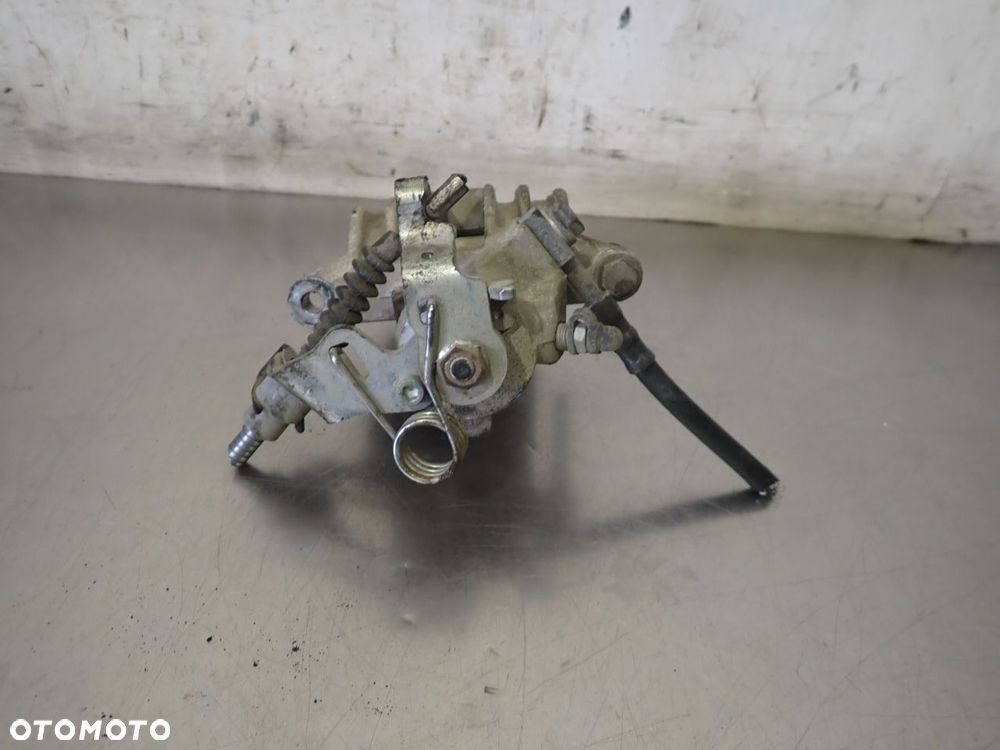 ZACISK HAMULCA LEWY TYŁ VOLKSWAGEN GOLF IV 1.4 - 2