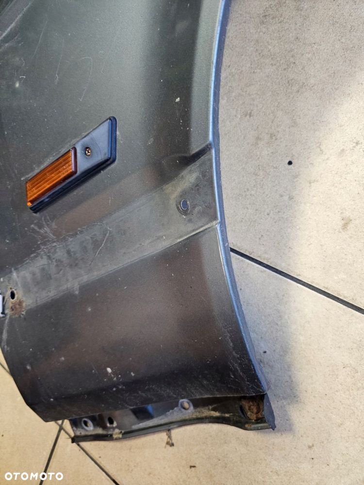 BŁOTNIK PRAWY PRZÓD BMW E32 SREBRNY - 9