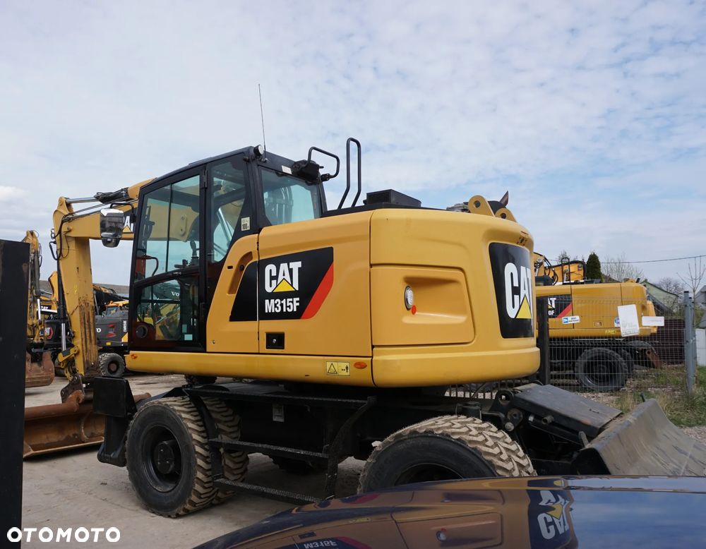 Caterpillar CAT M 315 F - 9