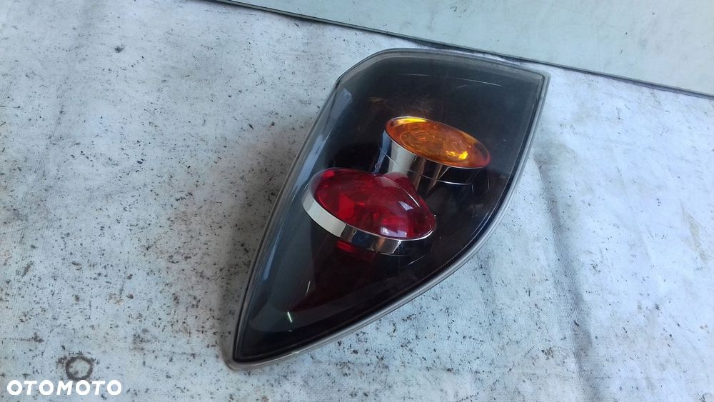 LAMPA LEWY TYŁ TYLNA MAZDA 3 BK HB 03- - 2