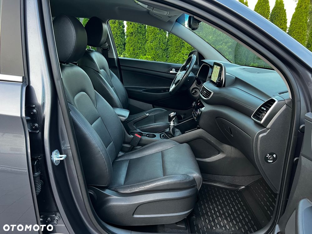 Hyundai Tucson blue 1.6 GDi 2WD Navi - 31