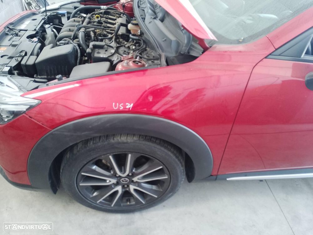 GUARDA-LAMAS FRENTE ESQUERDO MAZDA CX-3 DK - 1