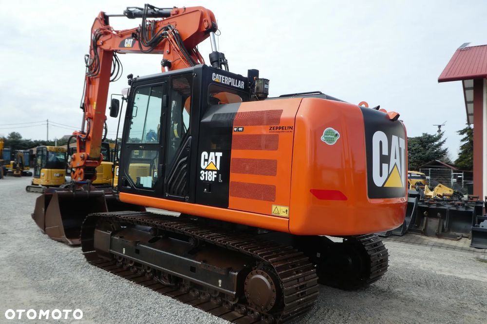 Caterpillar M 318F Z NIEMIEC TRZY ŁYŻKI - 4
