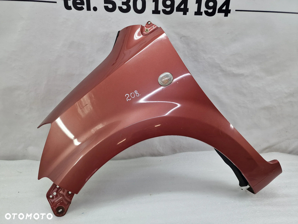 DAIHATSU SIRION II 05- LEWY BŁOTNIK PRZEDNI PRZÓD , RÓŻOWY , ŁADNY , NR AUKCJI BŁ208