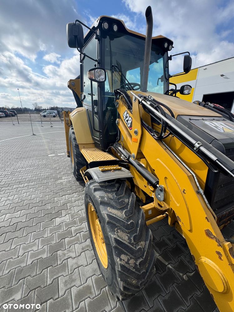Caterpillar 428 - 9