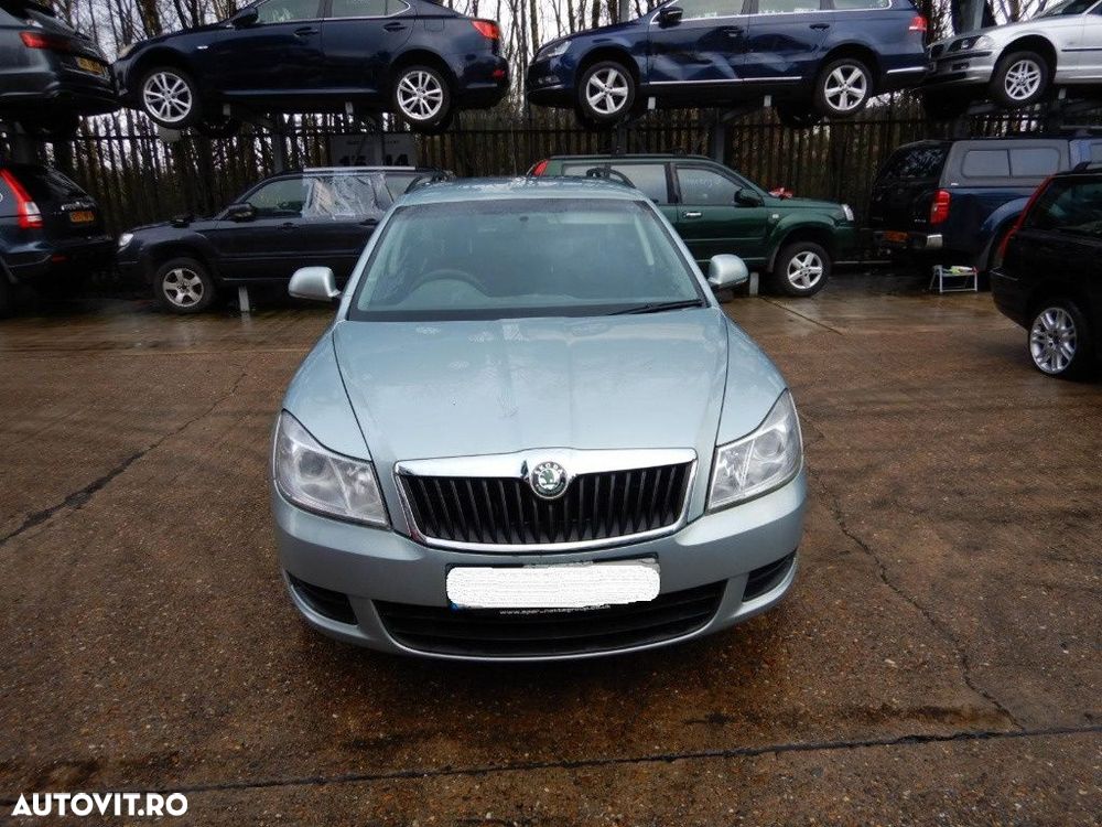 Set amortizoare fata Skoda Octavia 2 2010 Break 1.6 TDI - 12