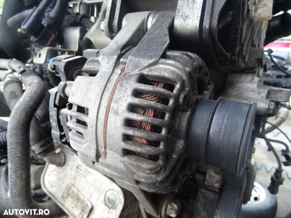 Alternator Opel Astra H 1.9 CDTI din 2007 - 1