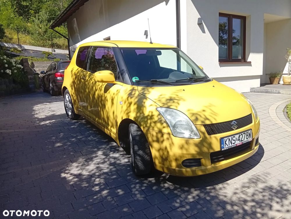 Suzuki Swift 1.3 Club - 4