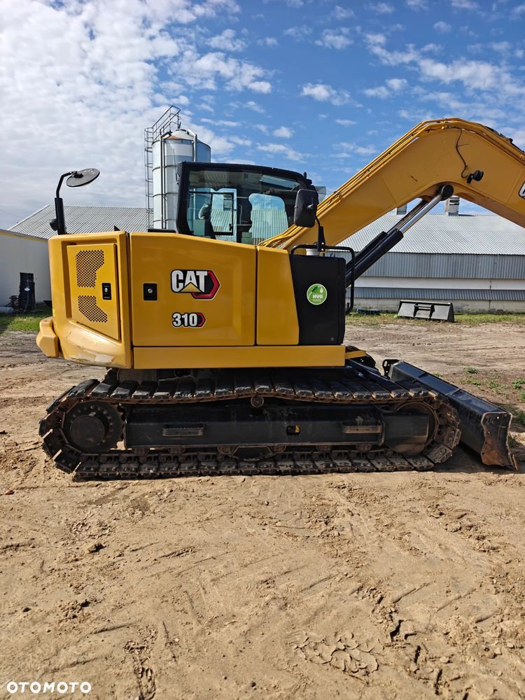 Caterpillar 310 - 6