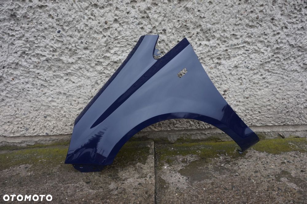 BŁOTNIK PRZEDNI LEWY OPEL CORSA D Y20Z - 4