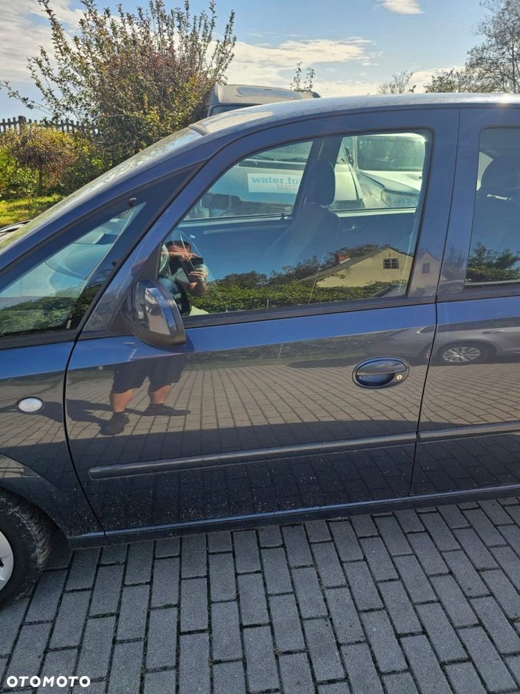 Drzwi lewy przód kompletne Opel Meriva A Z168