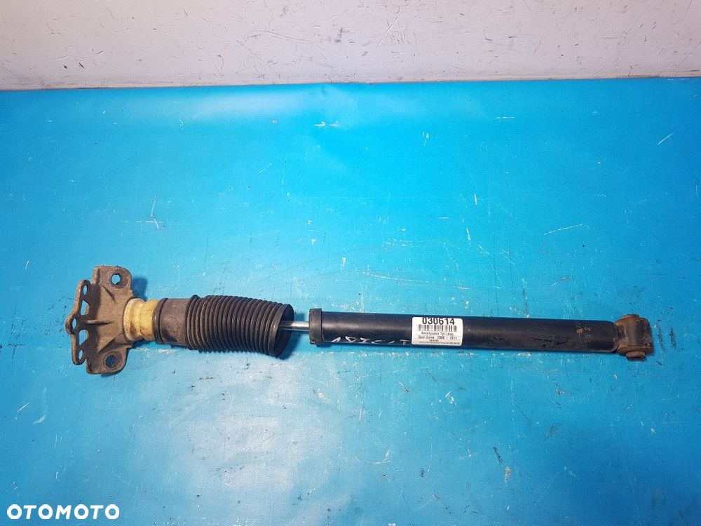 OPEL CORSA D 1.4 AMORTYZATOR TYŁ LEWY - 1