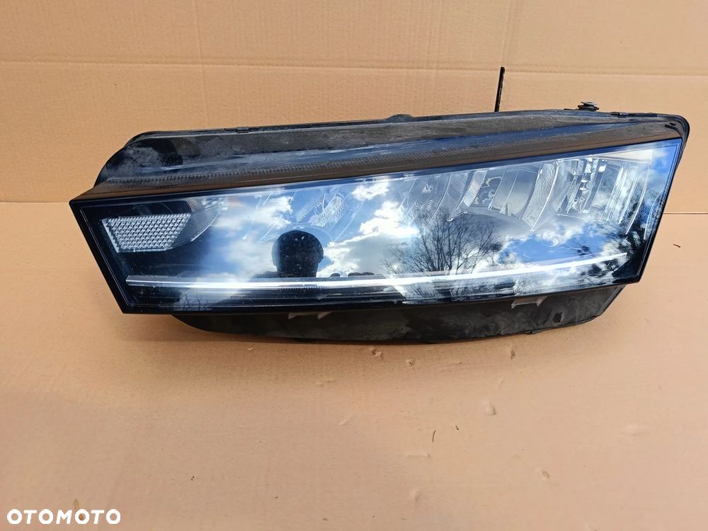 Full Led lewy Skoda Octavia IV 4 lampa lewa 5E4941015 połled