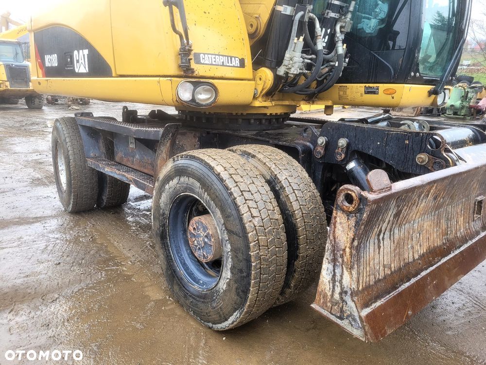 Caterpillar M318D - 7