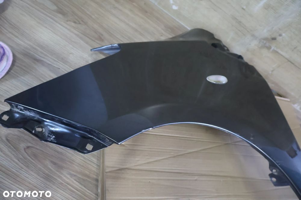 TOYOTA YARIS II 2 LIFT 09-11 BŁOTNIK LEWY PRZÓD PRZEDNI 1G3 - 10