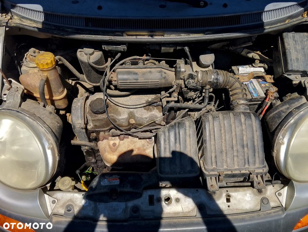 Daewoo Matiz M100 (98-07r.) 0.8 B 51KM. Silnik F8CV Skrzynia.Cały na części. GWARANCJA !!!  Przód Tył Zestaw Komplet Drzwi Klapa Zderzak Błotnik Maska Grill Atrapa Szyba Pas Lampa Lusterko Boczki Fotel Kanapa Kokpit Deska Rozdzielcza Przełącznik Włącznik Sterownik Przewody Wiązka Instalacja Moduł Komputer Czujnik Listwa Pompa Alternator Wtryski Głowica Rozrusznik Kompresor Sprzęgło Dwumas Silnik Skrzynia ABS Klimatyzacji Paliwa Wspomagania Kolektor Turbina Przepustnica Zawór Chłodnica Koło Hak Belka Sanki Zawieszenie Mcpherson Półoś Amortyzator Wydech Tłumik Zacisk Most - 5