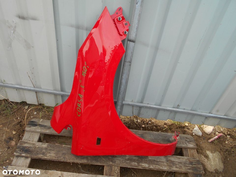 OPEL CORSA E BŁOTNIK PRAWY PRZÓD - 1