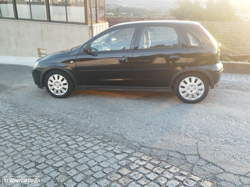 Opel Corsa 1.2 16V Cosmo - 10