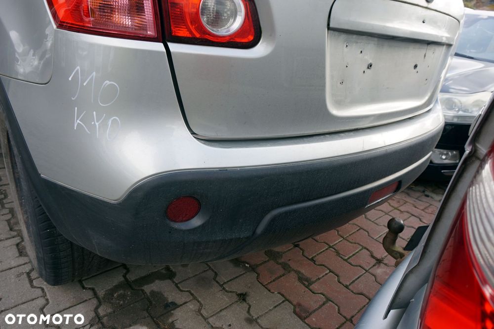 ZDERZAK TYLNY QASHQAI I J10 LIFT KY0  SREBRNY NISSAN 2009-2013 - 1