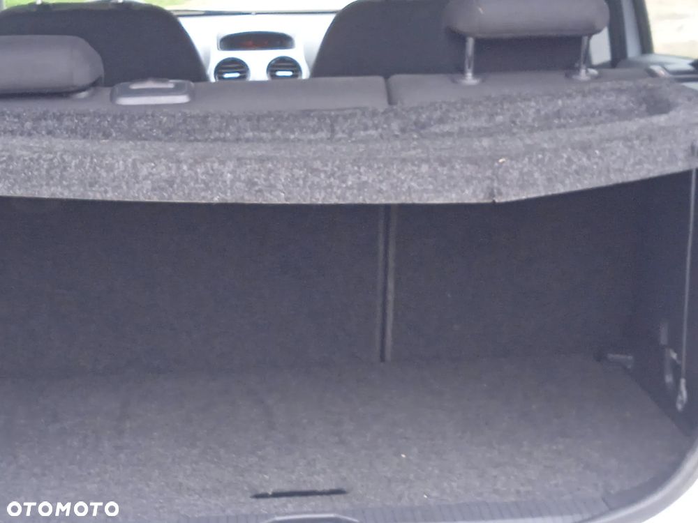 Opel Corsa 1.2 16V Cosmo - 9