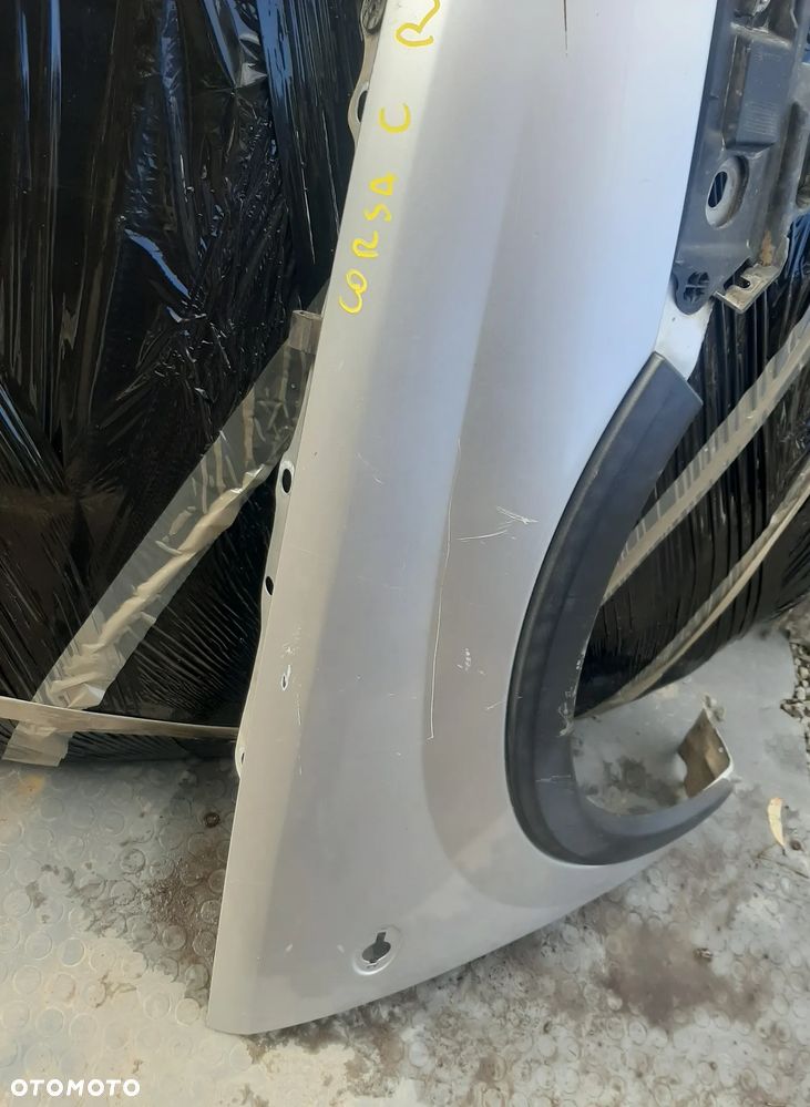 Błotnik OPEL CORSA C prawy lewy OE - 5