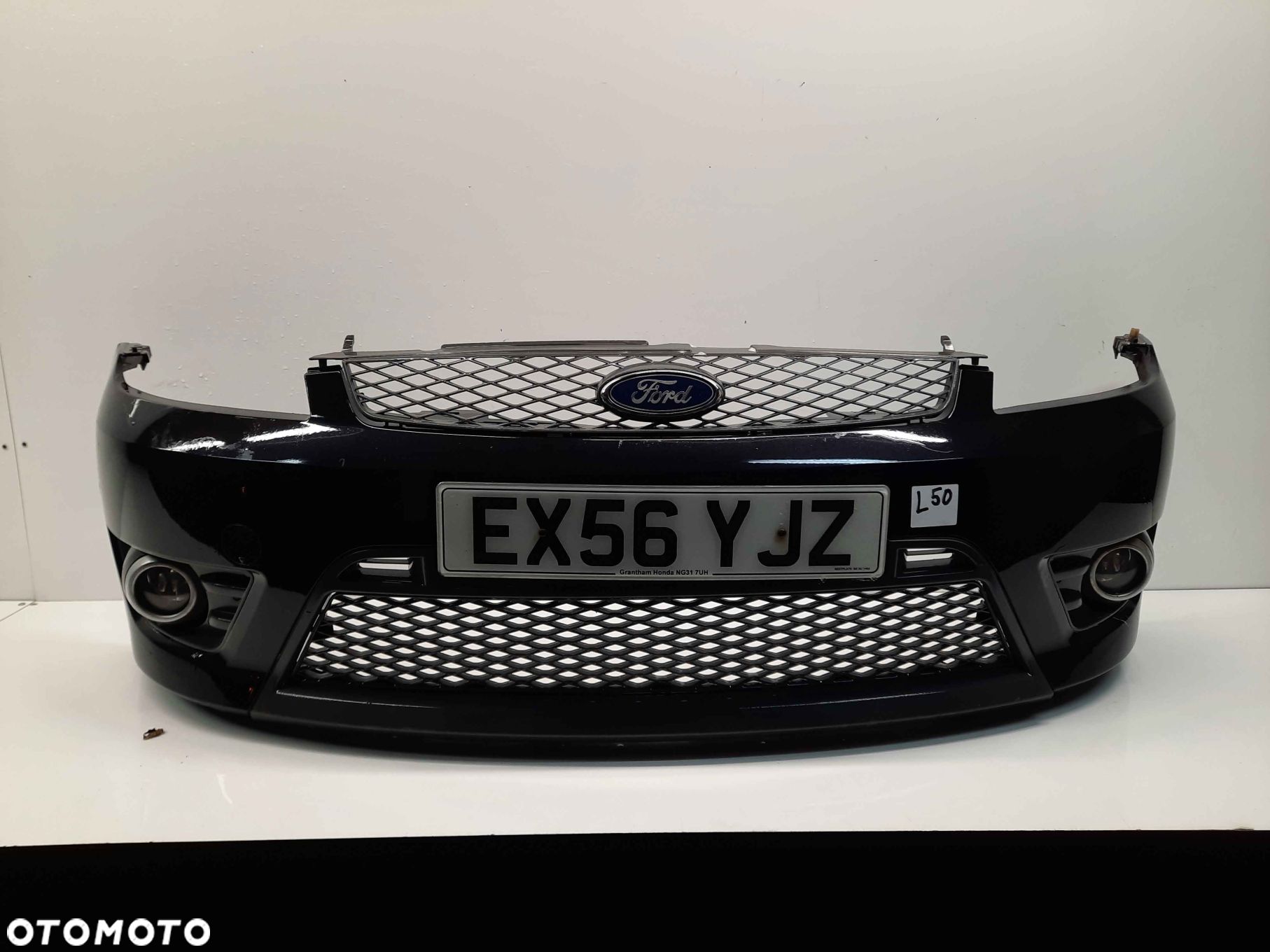 } ZDERZAK PRZÓD PRZEDNI FORD FIESTA MK.6 6 VI ST LIFT FL D2 CZARNY HALOGENY - 1