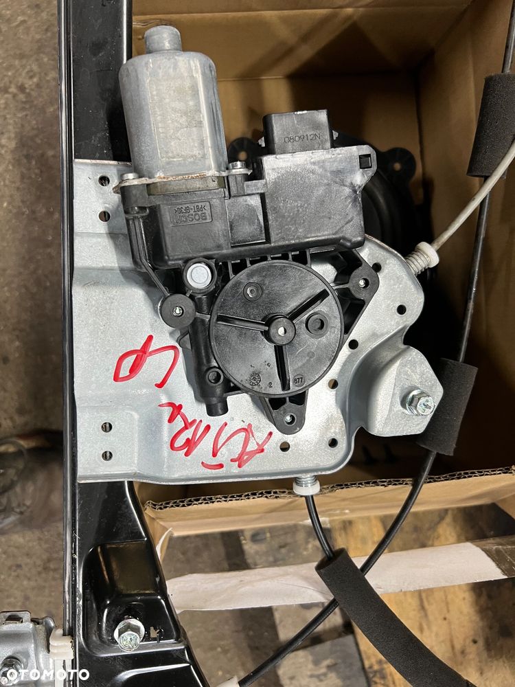 Podnośnik szyby lewy przód ssangyong actyon sport 2013r - 2