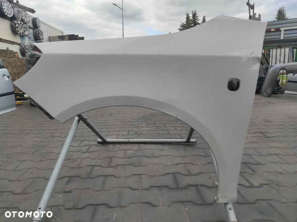 BŁOTNIK LEWY SKODA FABIA 2 LIFT LF9E 1026 BIAŁY WYSYŁKA !!!!!
