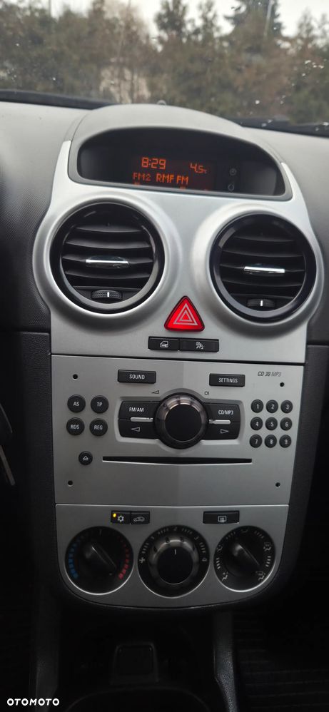 Opel Corsa 1.2 16V Enjoy - 23