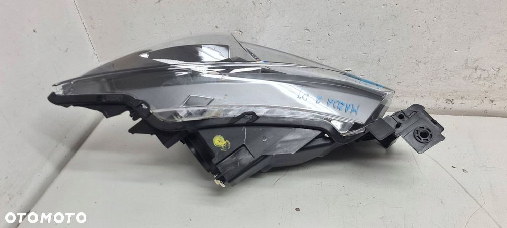 mazda 2 14- lampa reflektor lewy eu ładny - 5