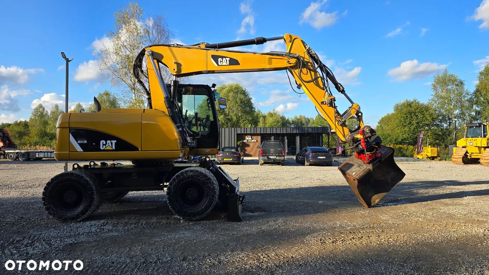 Caterpillar M313 - 23