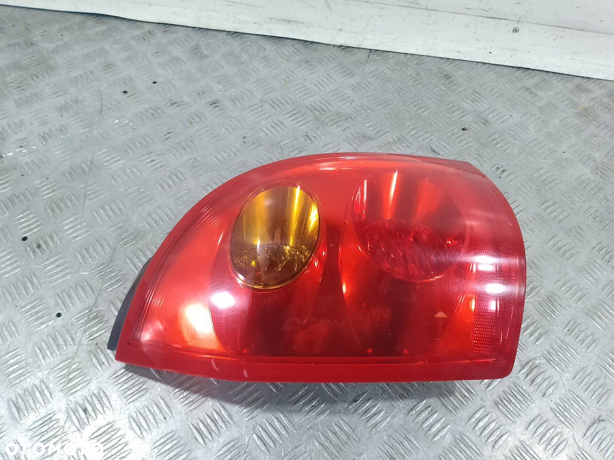 LAMPA TYLNA LEWA NISSAN PRIMERA P12 ( 03-07 ) KOMBI - 6