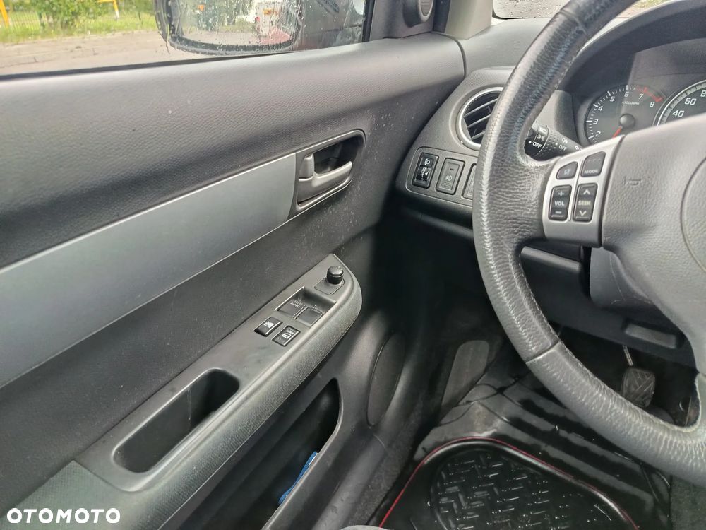 Suzuki Swift 1.3 Club - 12