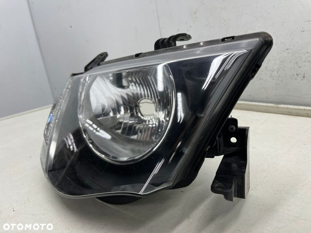 Lampa reflektor Mitsubishi L200 KA KB 05-10r. PRAWA przednia H4 oryginalna prawy przód EU 8301b462 - 9
