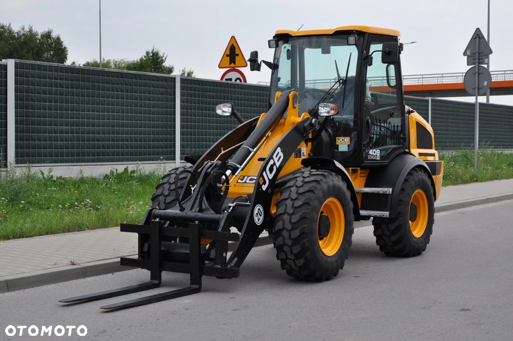 JCB WLS 409 SV FABRYCZNIE NOWA ! DOSTĘPNA OD RĘKI ! WIDŁY DO PALET SZYBKOZŁĄCZE HYDRAULICZNE - 1