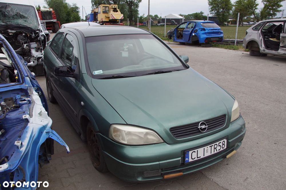 Auto na części - Opel Astra II G 1.6 16V 100 KM X16XEL F17 Z374 1998R Silnik Skrzynia Drzwi Maska Błotnik Zderzak Lampa Lusterko Klamka Szyba Deska Kokpit Sterownik Moduł Czujnik Licznik Panel Kierownica - 7