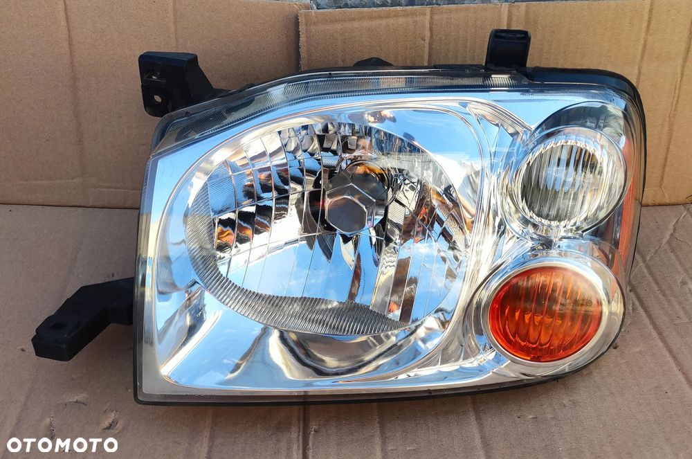 Reflektor lewy Lampa lewa Nissan Navara 2001-