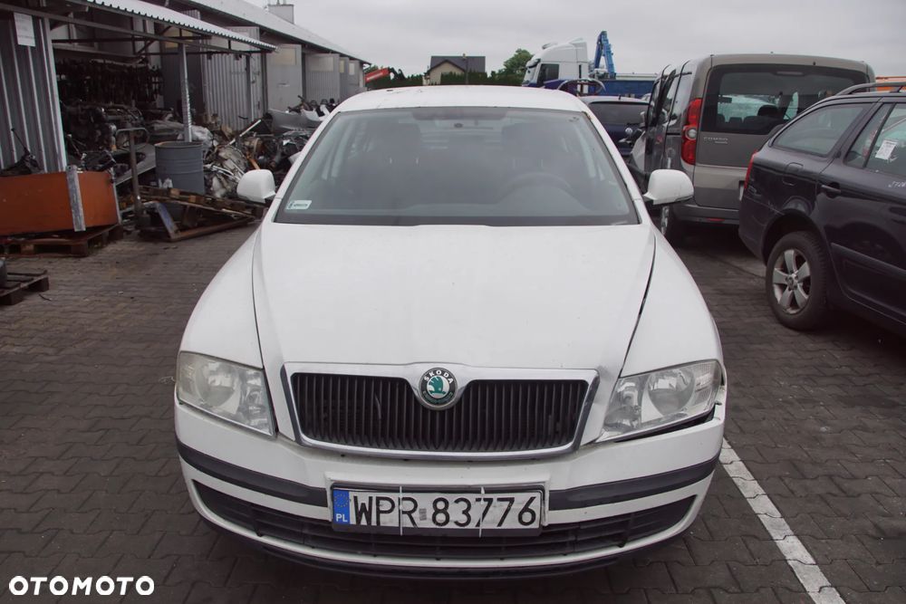 Auto na części - Skoda Octavia II Lift 1.6 MPI 102 KM BSE LVN LF9E 2011R Silnik Skrzynia Drzwi Maska Błotnik Zderzak Klapa Lampa Lusterko Klamka Szyba Deska Kokpit Sterownik Moduł Czujnik Licznik Panel Kierownica - 9
