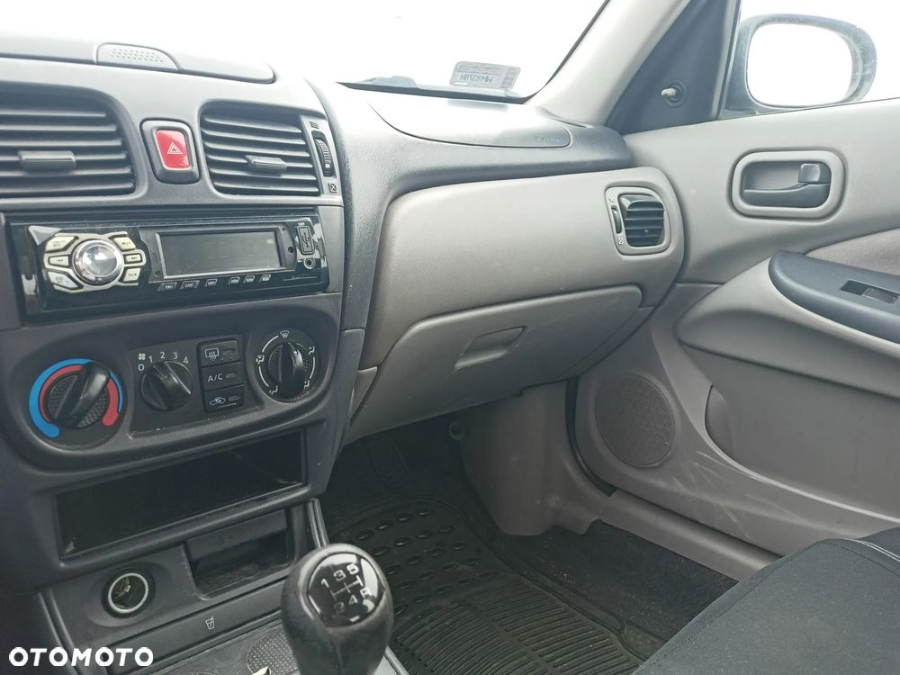 Nissan Almera - 11