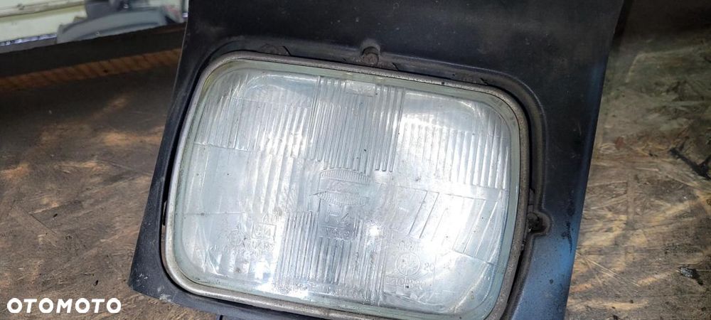 lampa prawa przód mazda 323f - 2