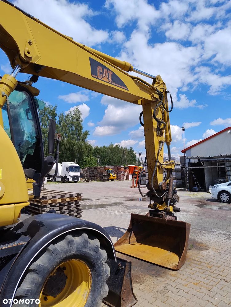 Caterpillar M313C - 8