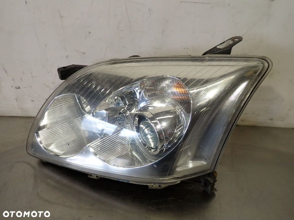 LAMPA LEWA PRZEDNIA SOCZEWKA TOYOTA AVENSIS T25 - 2
