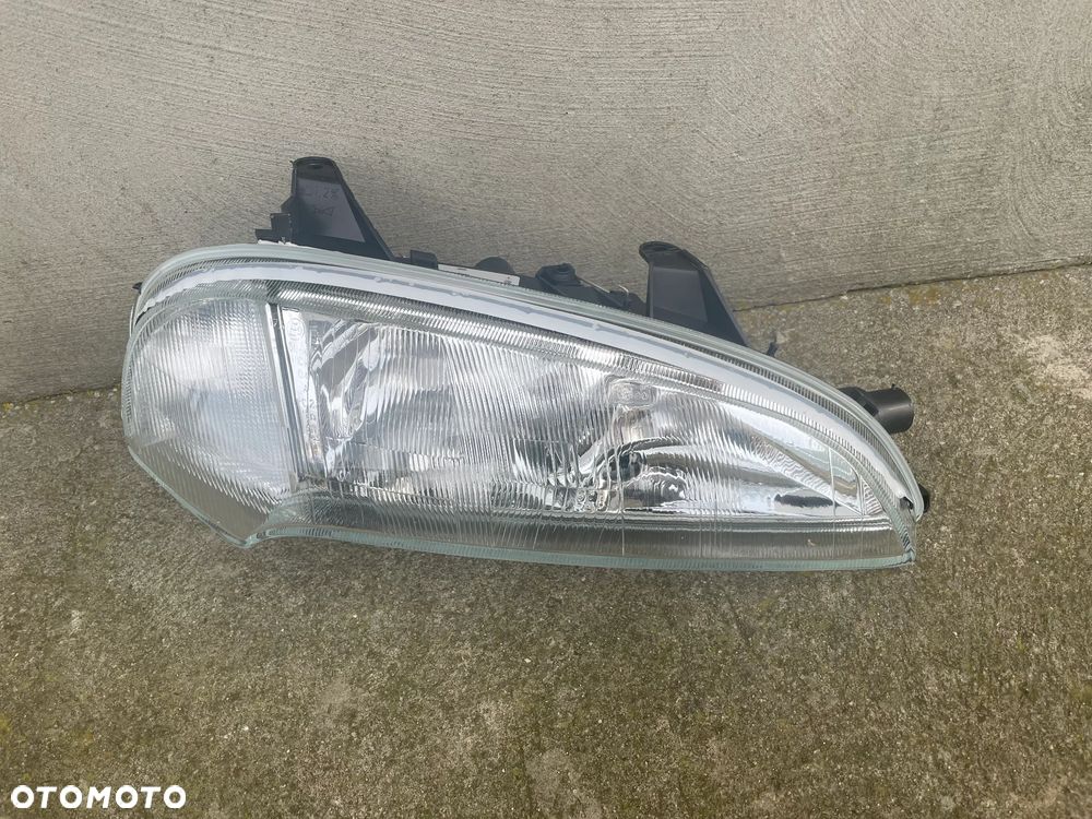 LAMPA PRZEDNIA PRAWA OPEL TIGRA 1994-2000 - NOWA VALEO - 1