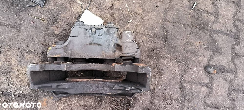 ZACISK HAMULCOWY PRZÓD PRAWY MAN TGX 18.440 - 6