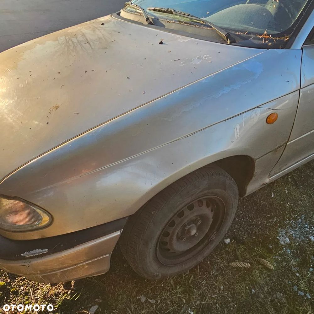 Opel Astra Classic F 1,4 B  (Z489) pojazd na części: maska, zderzak, drzwi, szyby, lusterka, chłodnica - 4